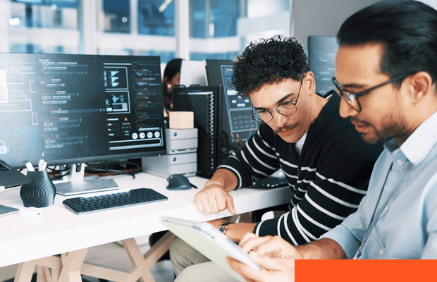 Cloud Integrations and API Development Software developers reviewing a cloud integration project