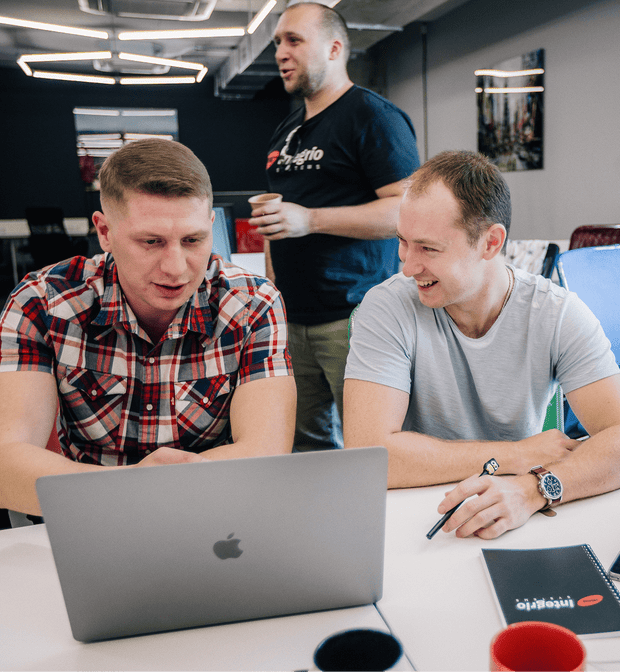 Penetration testing specialists reviewing software security Integrio team discussing penetration testing for software products