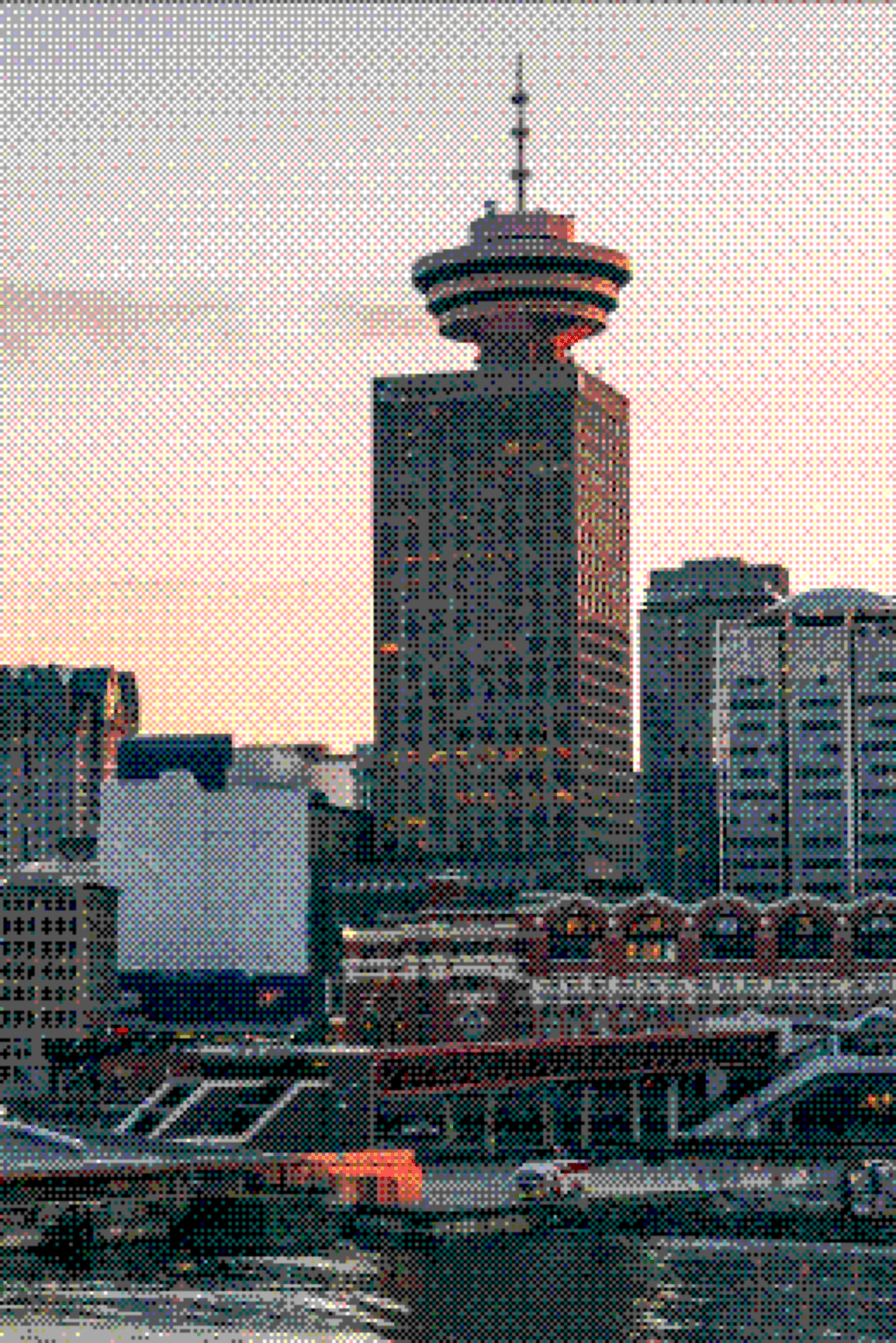 Software development company in Vancouver Vancouver Lookout tower and the waterfront buildings at dusk