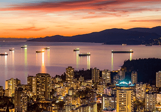 Real estate & property management City skyline and bay at sunset