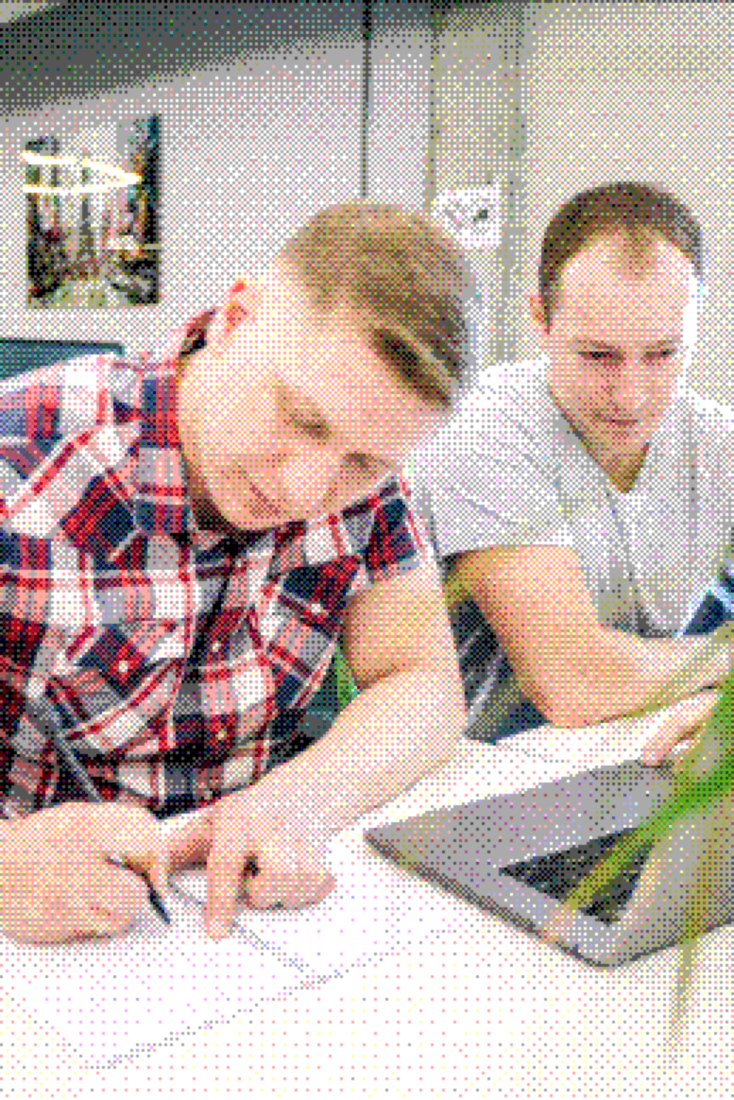 SaaS product development team Two colleagues working together on a SaaS product plan